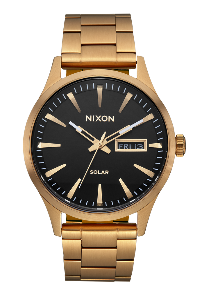 Nixon black and clearance gold watch